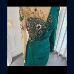 Beautiful gown for any occasion it’s a teal blue color very comfortable and cute